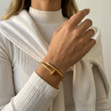 Elegant Nail Bracelet in Gold